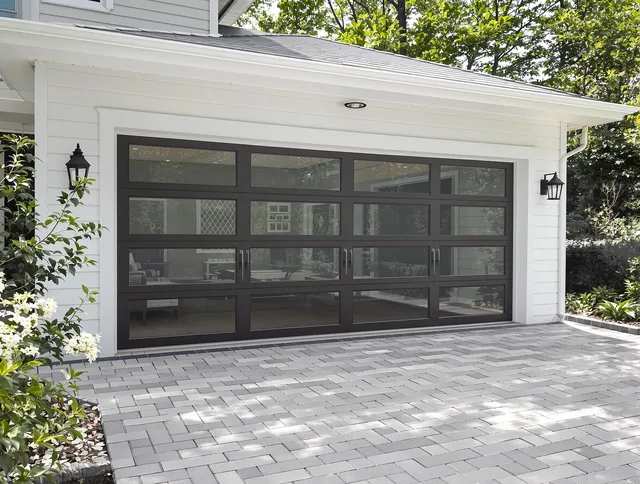 Sagamore Hills Garage Door Repair design specialist presenting custom garage door options to Sagamore Hills homeowner