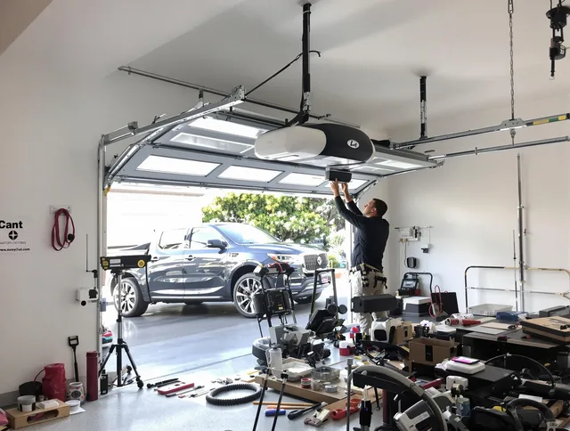 Sagamore Hills Garage Door Repair specialist installing smart garage door opener system in Sagamore Hills home