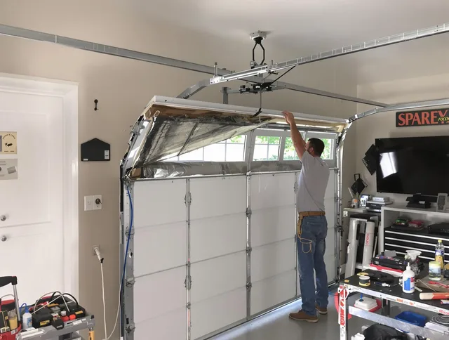 Garage door section replacement by Sagamore Hills Garage Door Repair in Sagamore Hills