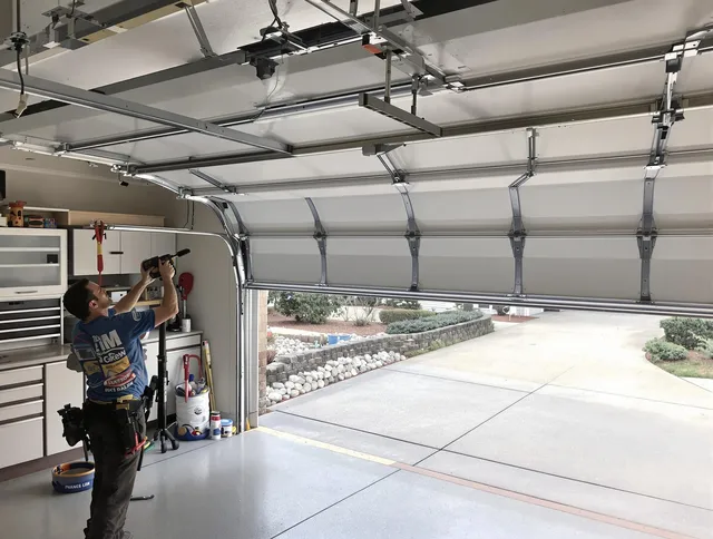 Garage door track repair service by Sagamore Hills Garage Door Repair in Sagamore Hills